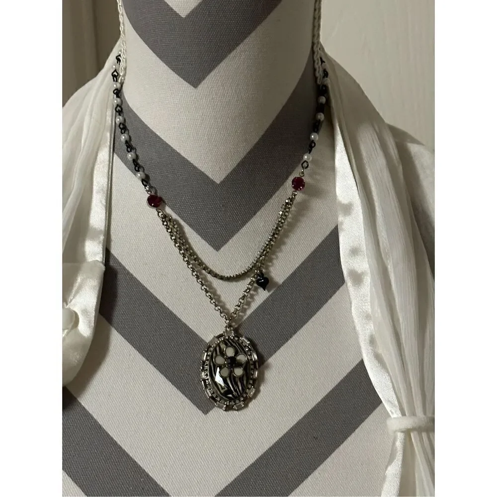 Betsey Johnson, oval zebra print beaded pendant